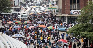 People crowd the Central Business District for their last minute Christmas shopping in Harare, Zimbabwe, Dec. 22, 2023. (EPA Photo)