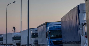 Trucks belonging to different Polish transport companies block access to the Polish-Ukraine border crossing in protest against &quot;unfair&quot; competition in Hrebenne, Poland, Dec. 4, 2023. (AFP Photo)