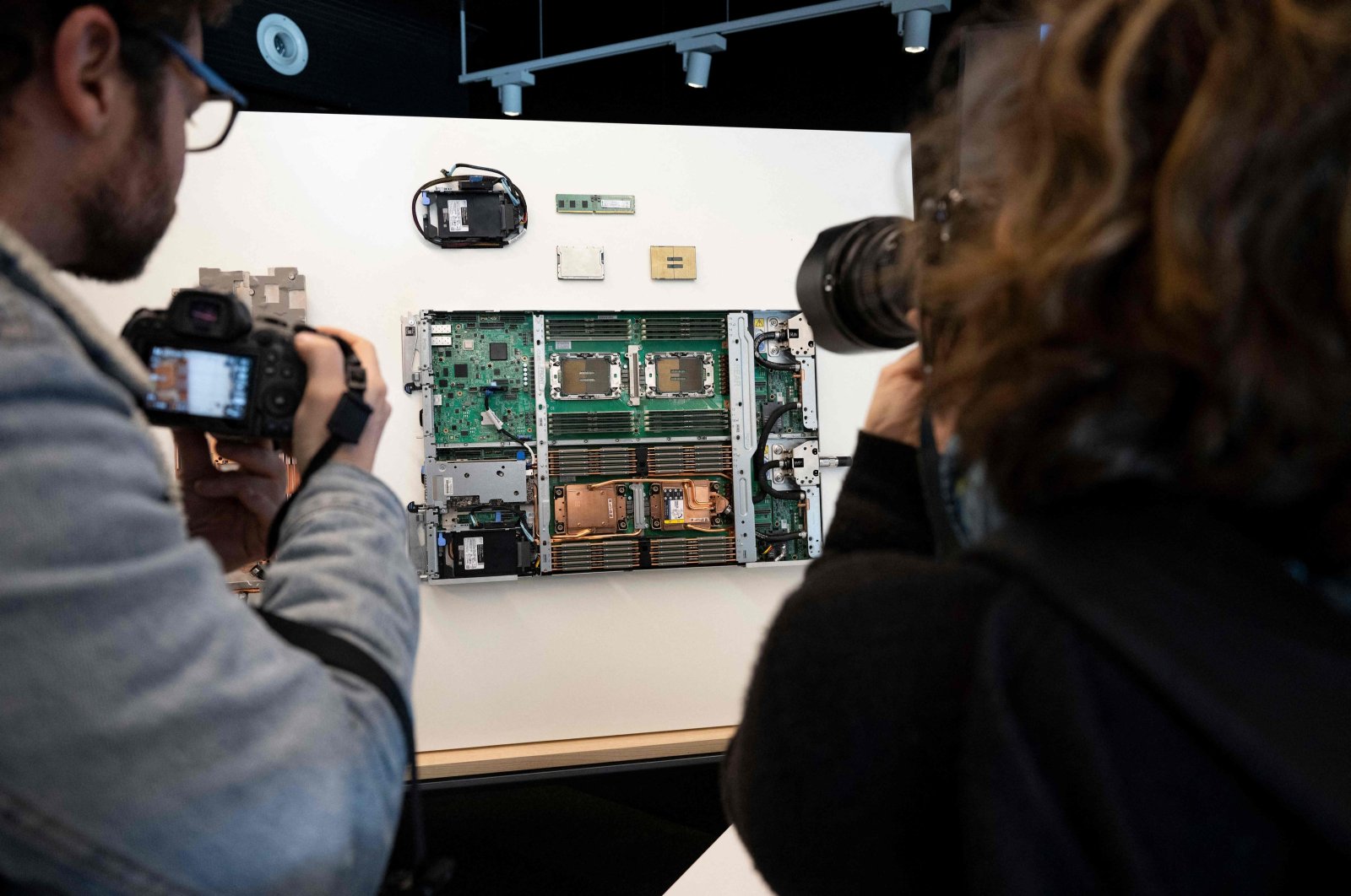 Journalists take pictures of components of the MareNostrum 5 supercomputer, during a press visit of the Supercomputing Centre in Barcelona, Spain, Dec. 15, 2023. (AFP Photo)