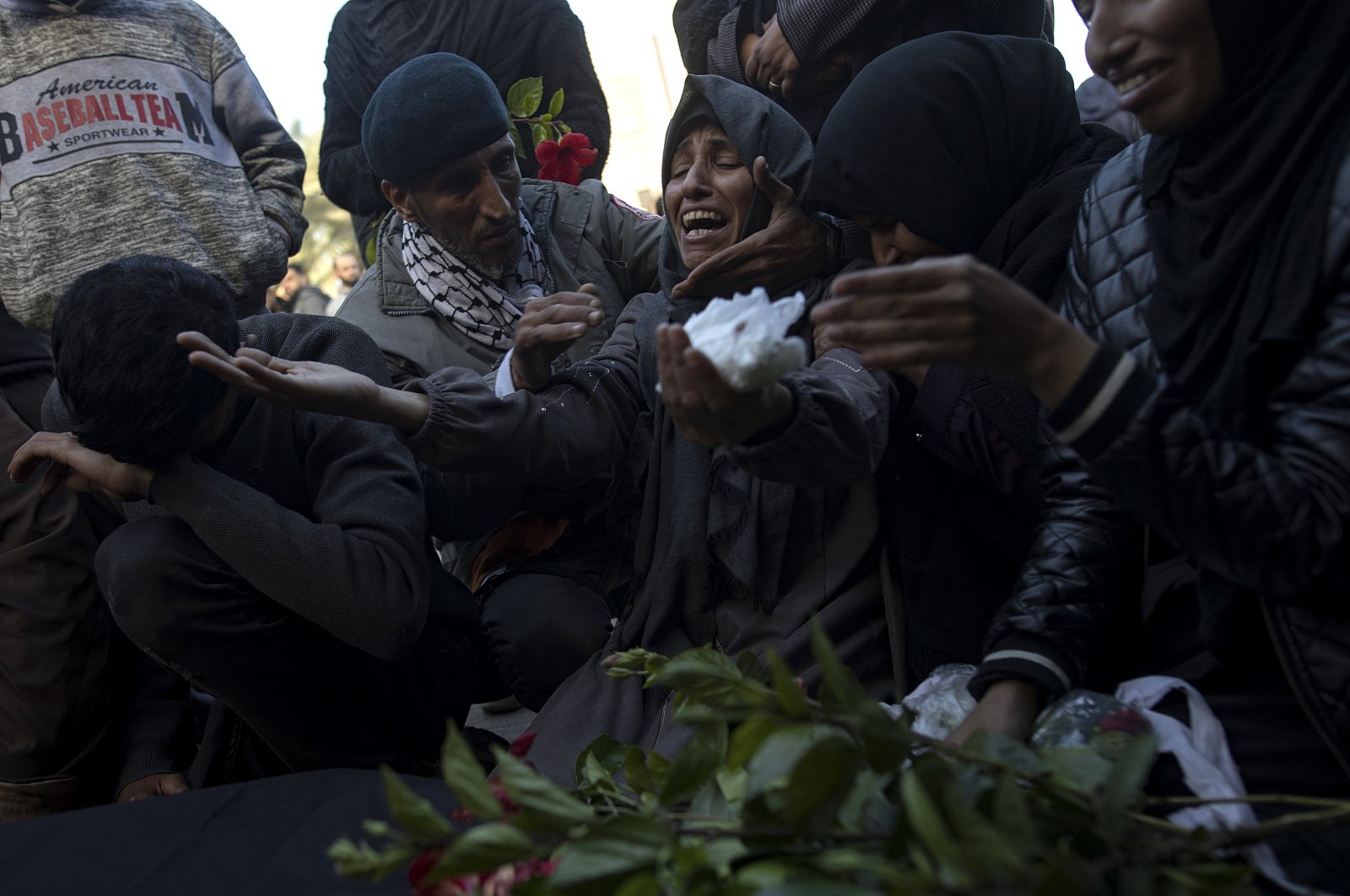 Families mourn a Palestinian man killed in Israeli air strikes, Khan Younis, southern Gaza Strip, Palestine, Dec. 24, 2023. (EPA Photo)