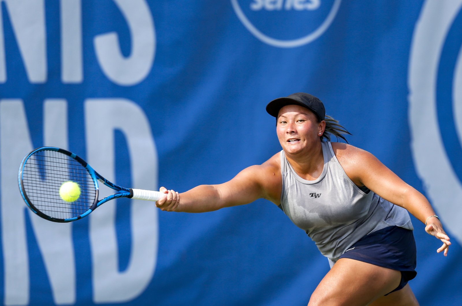 Tara Moore of Britain reaches out for the ball during her match against Catherine Harrison of the U.S., Jacobs Pavilion, Cleveland, Ohio, U.S., Aug. 22, 2021. (Getty Images Photo)