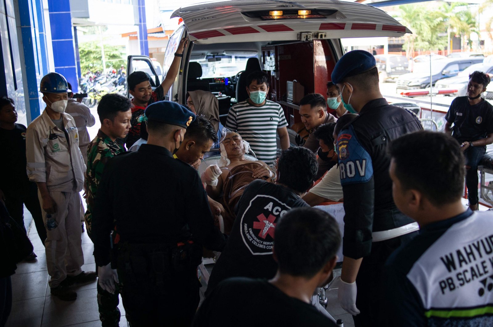 A Chinese worker who was injured in the explosion at a nickel smelter is brought to the Morowali Regional General Hospital, Central Sulawesi, Indonesia, Dec. 24, 2023. (AFP Photo)