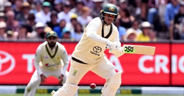 Australia&#039;s batsman Usman Khawaja plays a shot on the first day of the second cricket Test match between Australia and Pakistan at the Melbourne Cricket Ground (MCG), Melbourne, Australia, Dec. 26, 2023. (AFP Photo) 