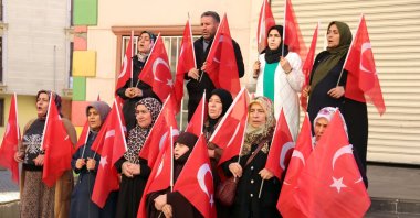 Families are seen protesting the PKK in front of the Peoples' Democratic Party (HDP) headquarters in southeastern Diyarbakır province, Türkiye, Dec.25, 2023. (AA Photo)