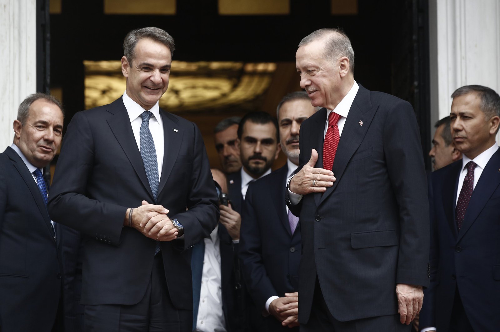 President Recep Tayyip Erdoğan (C-R) gestures next to Greek Prime Minister Kyriakos Mitsotakis (C-L) after their meeting at Maximos Mansion in Athens, Greece, Dec. 7, 2023.