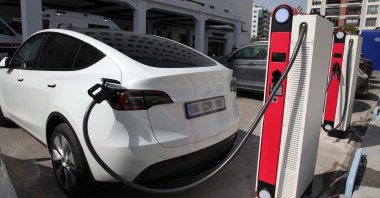 A Tesla car model is seen charging in an undisclosed location, Türkiye, Nov. 29, 2023. (IHA Photo)