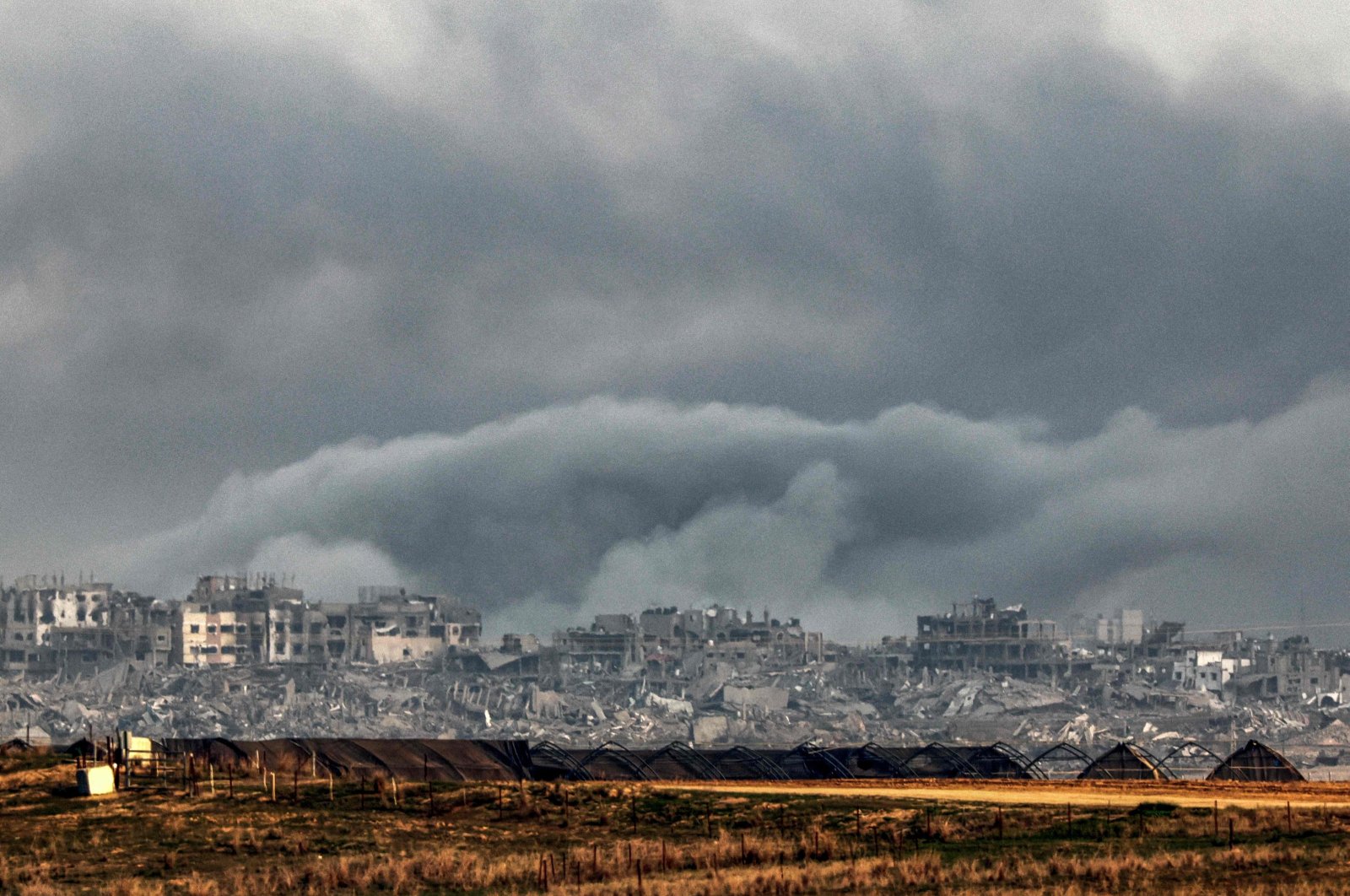 Smoke billows over the northern Gaza Strip during Israeli bombardment, Gaza, Palestine, Dec. 27, 2023. (AFP Photo)