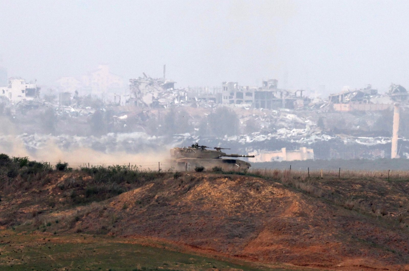 An Israeli military vehicle patrols an area near the Israeli-Gaza border, Dec. 27, 2023. (EPA Photo)