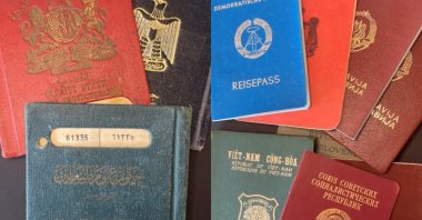 An array of old passports of many nations, including Vietnam, Palestine and Germany, sits on display at Ross Nochimson&#039;s residence in New Jersey, U.S., Dec. 28, 2023. (Photo courtesy of Ross Nochimson)