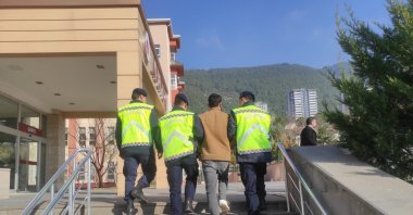 Gendarmerie troops escort a captured Daesh suspect in Kahramanmaraş, southern Türkiye, Dec. 26, 2023. (AA Photo)