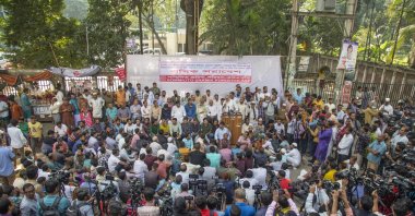 Garment workers&#039; union members hold placards and shout slogans as they take part in a protest to stress their six-point demand, including an increase in minimum wages, in front of the Press Club in Dhaka, Bangladesh, Dec. 1, 2023. (EPA Photo)