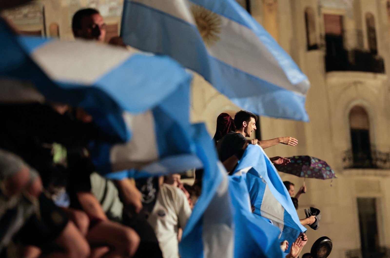 Dozens of people participate in a demonstration against the economic measures announced by Argentina&#039;s President Javier Milei, in front of the National Congress in Buenos Aires, Argentina, Dec. 20, 2023. (EPA Photo)