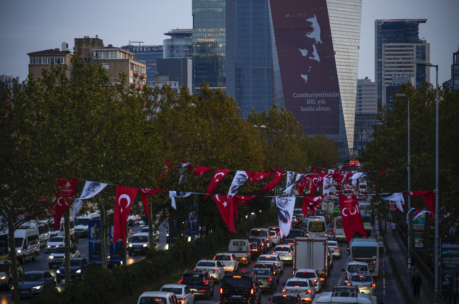 A poster of Mustafa Kemal Atatürk, the nation&#039;s founding leader, marking the 100 year anniversary of the modern Türkiye, is displayed on a commercial tower in Istanbul, Türkiye, Oct. 25, 2023. (AP Photo)