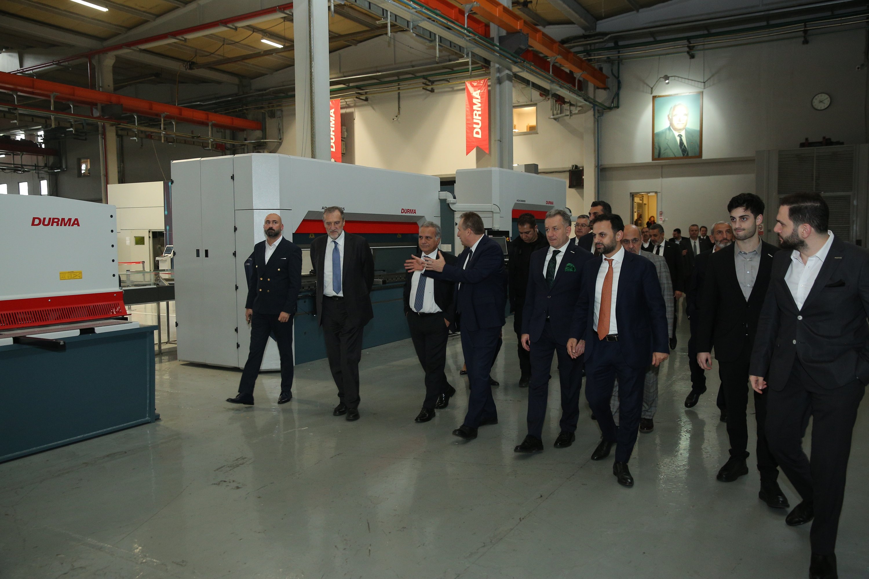 Italian Ambassador to Türkiye Giorgio Marrapodi (C) is accompanied by MÜSIAD executives during a visit to a factory in Bursa, northwestern Türkiye, Nov. 30, 2023.