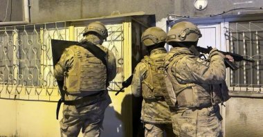 Turkish gendarmerie officers prepare to raid a house hiding five Iraqi nationals linked to the Daesh terrorist group during an operation in the central Yozgat province, Türkiye, Dec. 28, 2023. (DHA Photo)