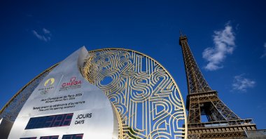 The official Olympic countdown clock near the Eiffel Tower displays the remaining days and time until the 2024 Summer Olympics, Paris, France, July 6, 2023. (Getty Images Photo)