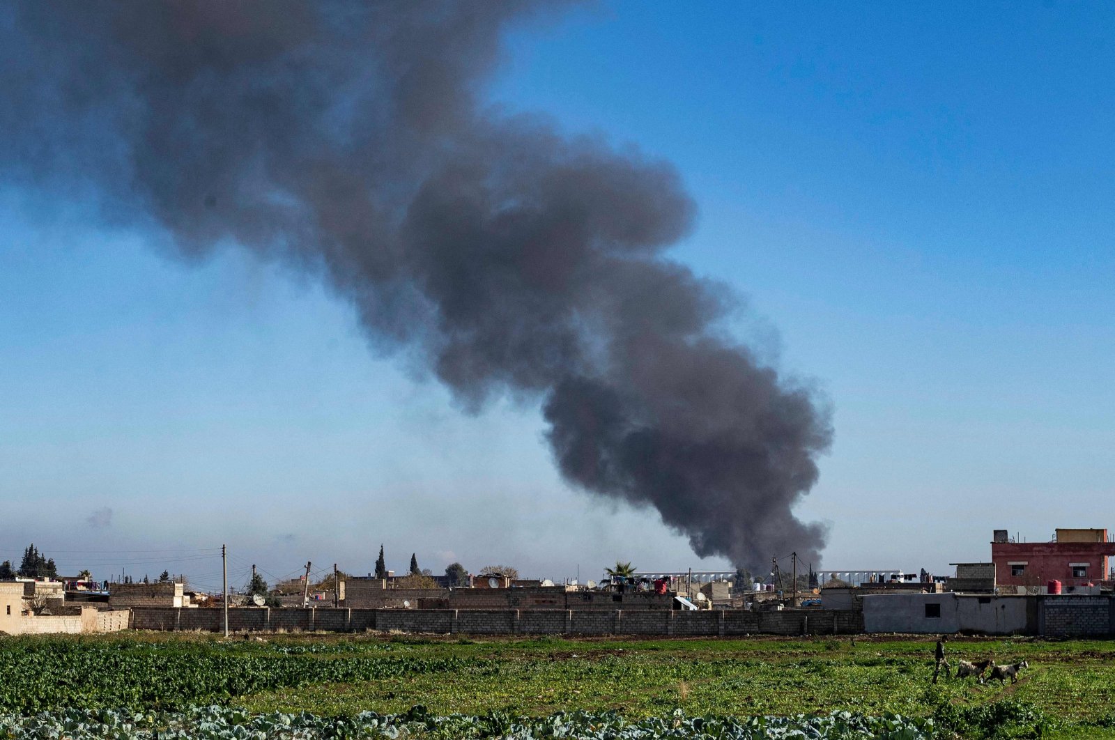Smoke billows after Turkish airstrikes targeting PKK terrorists, Qamishli, Syria, Dec. 25, 2023. (AFP Photo)