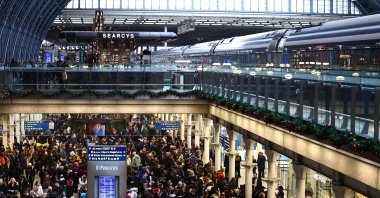 Passengers wait for news of Eurostar departures at St Pancras station in London on Dec. 30, 2023. (AFP Photo)