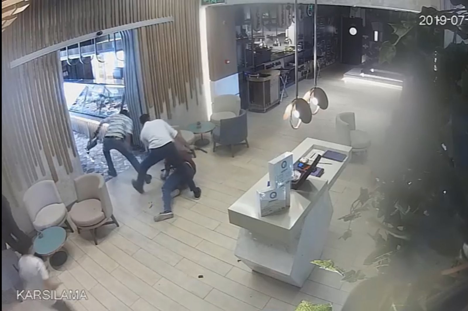 Camera footage shows the moment of the 2019 attack on Turkish diplomat Osman Köse by PKK terrorists in a restaurant in Irbil, Iraq. (DHA Photo)
