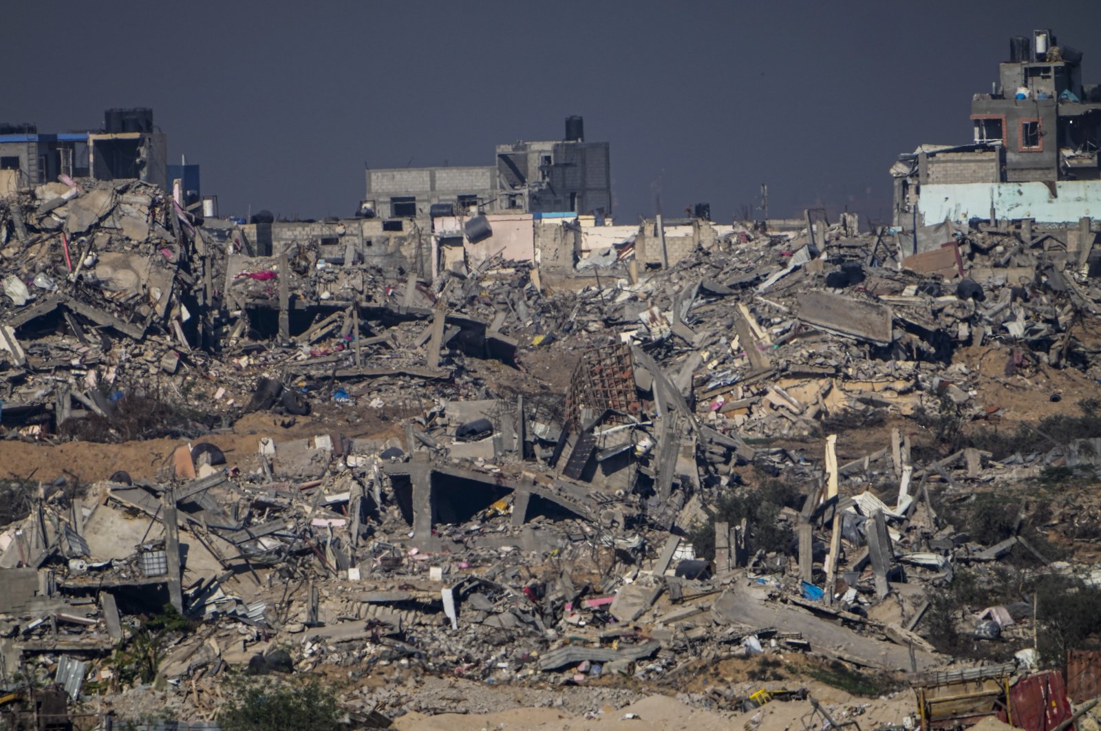 Destroyed buildings in the Gaza Strip, as seen from southern Israel, Dec. 29, 2023. (AP Photo)