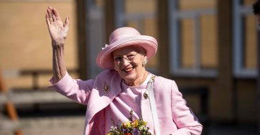 Queen Margrethe II of Denmark waves to onlookers as she visits Fredericia Municipality, Denmark, Sept. 1, 2023, (AFP Photo)