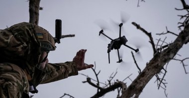 A Ukrainian serviceman launches a kamikaze FPV drone at a front line, amid Russia's attack on Ukraine, near the city of Bakhmut in Donetsk region, Ukraine, Dec.12, 2023. (Reuters File Photo)