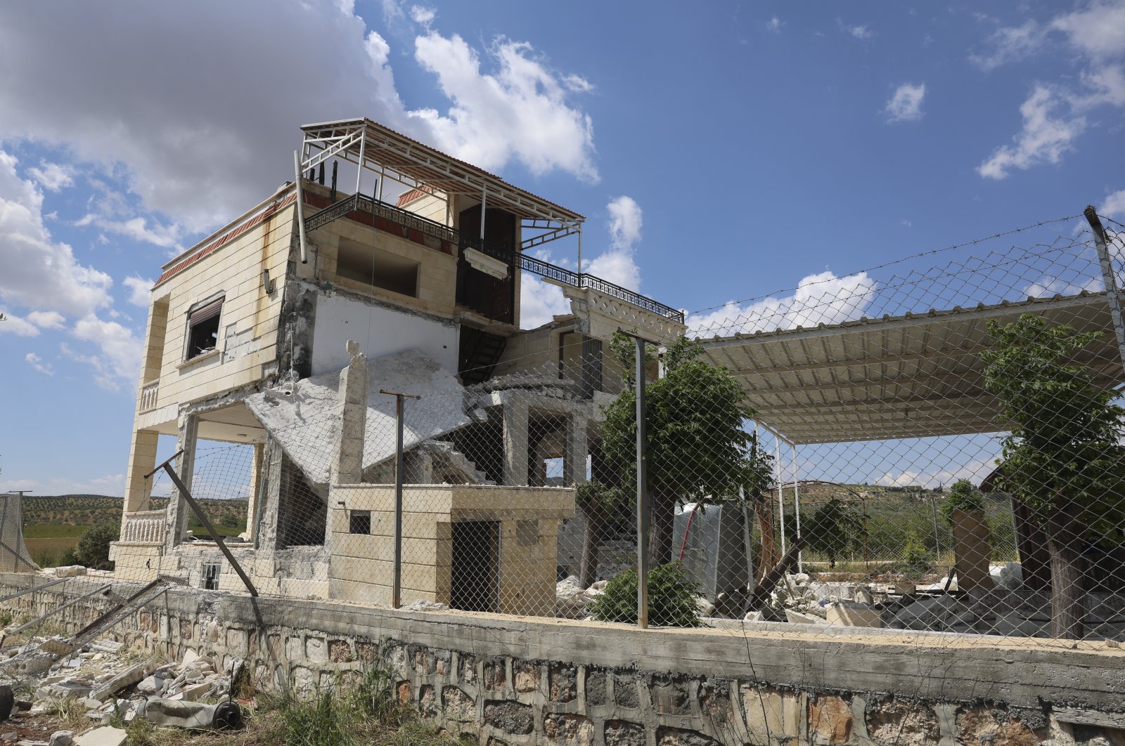 A house north of the town of Aleppo, Syria where the so-called Daesh leader, codenamed Abu Hussein al-Qurayshi, had been killed by Turkish intelligence (MIT) is seen, Aleppo, Syria, May 1, 2023. (AP Photo)