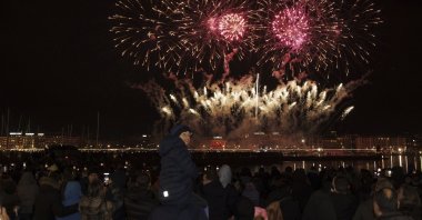 Fireworks illuminate the sky in the bay of Geneva during New Year&#039;s celebrations in Geneva, Switzerland, Jan. 1, 2024. (AP Photo)