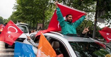 Supporters of the Justice and Development Party (AK Party) wave Turkish flags and party flags after President Recep Tayyip Erdoğan won the general election, Istanbul, Türkiye, May 28, 2023. (Getty Images)