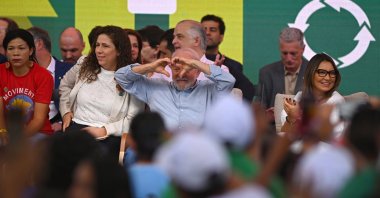 Brazil's President Luiz Inacio Lula da Silva (C) gestures during the Christmas celebration of recyclers and homeless people at the recycling cooperative fair at the Mane Garrincha Stadium, in Brasilia, Brazil, Dec. 22, 2023. (EPA Photo)