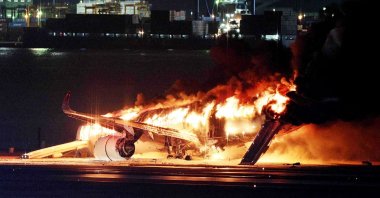 A Japan Airlines plane engulfed in fire on a runway at Haneda Airport, Tokyo, Japan, Jan. 2, 2024. (AFP Photo)