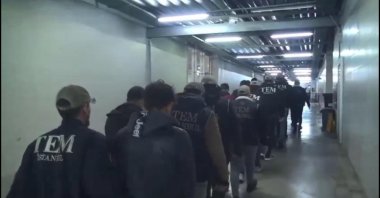 Counterterrorism police accompany captured suspects, Istanbul, Türkiye, Jan. 2, 2024. (DHA Photo)