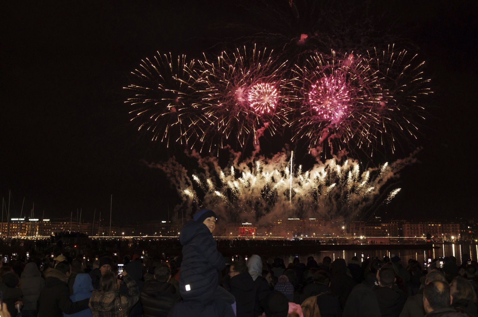 Fireworks illuminate the sky in the bay of Geneva during New Year&#039;s celebrations in Geneva, Switzerland, Jan. 1, 2024. (AP Photo)