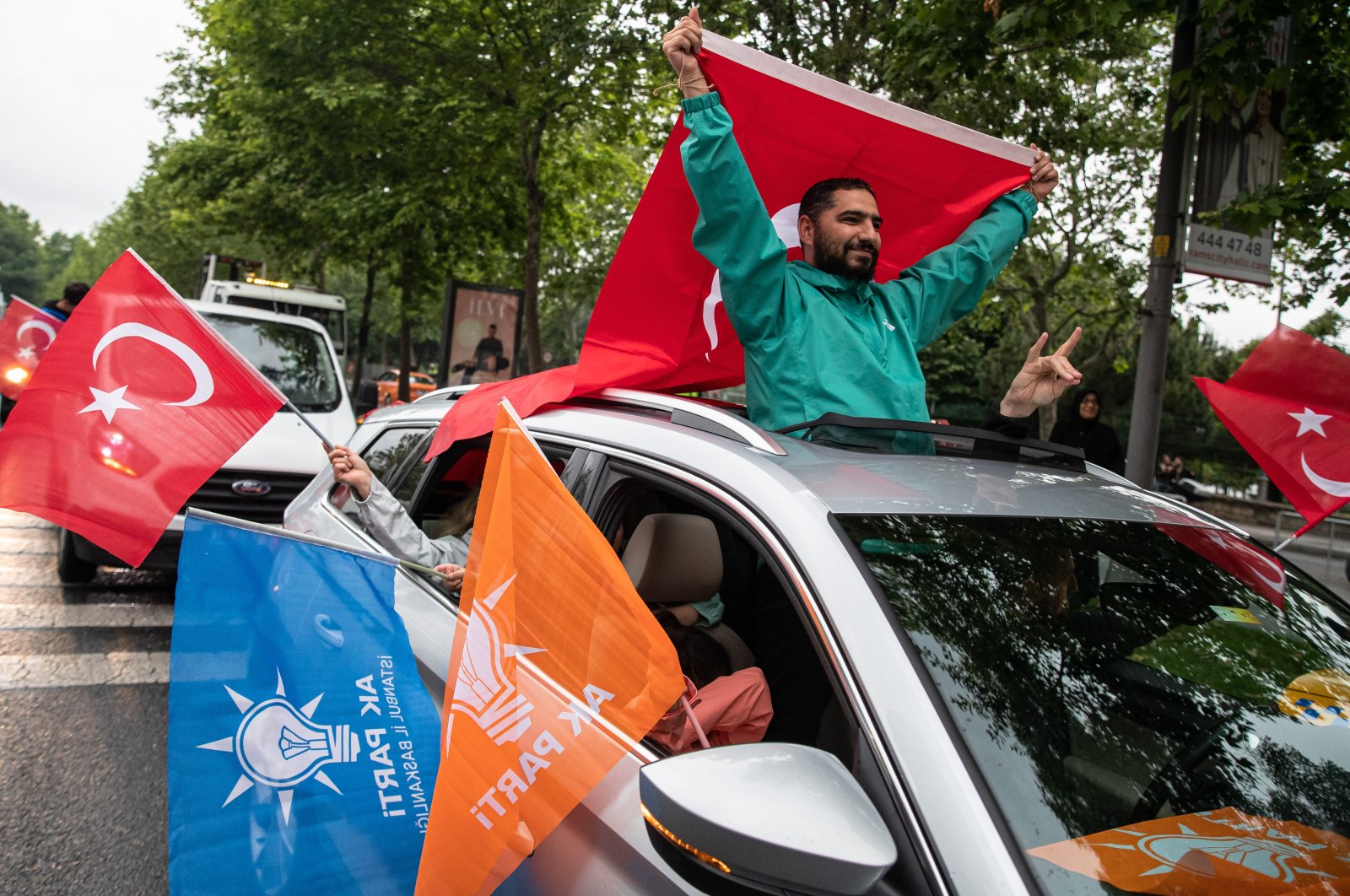 Supporters of the Justice and Development Party (AK Party) wave Turkish flags and party flags after President Recep Tayyip Erdoğan won the general election, Istanbul, Türkiye, May 28, 2023. (Getty Images)