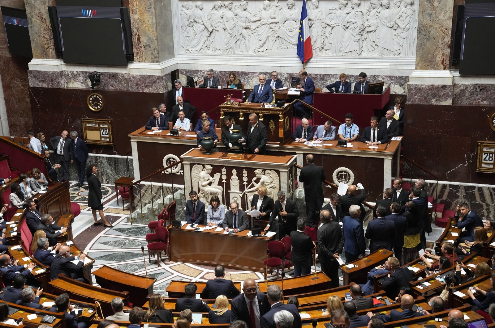 Far-right National Rally&#039;s Jose Gonzalez (Top C), the oldest parliament member, chairs the National Assembly as parliament members vote to elect the house speaker, in Paris, France, June 28, 2022. (AP Photo)