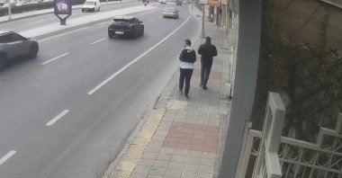 This screenshot from footage provided by police shows the suspects doing reconnaissance work for their attacks. (DHA Photo)