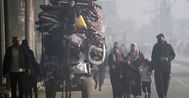Residents of Al Nusairat and Al Bureij refugee camps begin to evacuate following an Israeli warning of increased military operations in the camps in the Gaza strip, Dec. 26, 2023. (EPA File Photo)