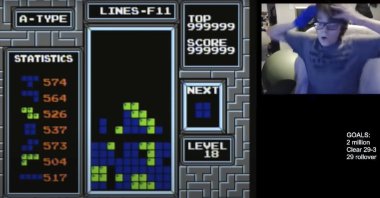 In this image taken from video, a 13-year-old player named Willis Gibson reacts after playing a game of Tetris. Gibson in late December became the first player to officially "beat” the original Nintendo version of the game. (AP Photo)