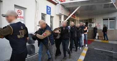 Police escort suspects to a medical check after their detention, Istanbul, Türkiye, Jan. 4, 2024. (AA Photo)