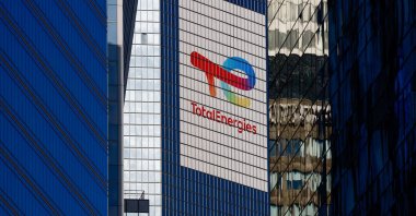 The logo of French oil and gas company TotalEnergies is seen at the company's headquarters skyscraper in the financial and business district of La Defense, near Paris, France, Sept. 14, 2023. (Reuters Photo)