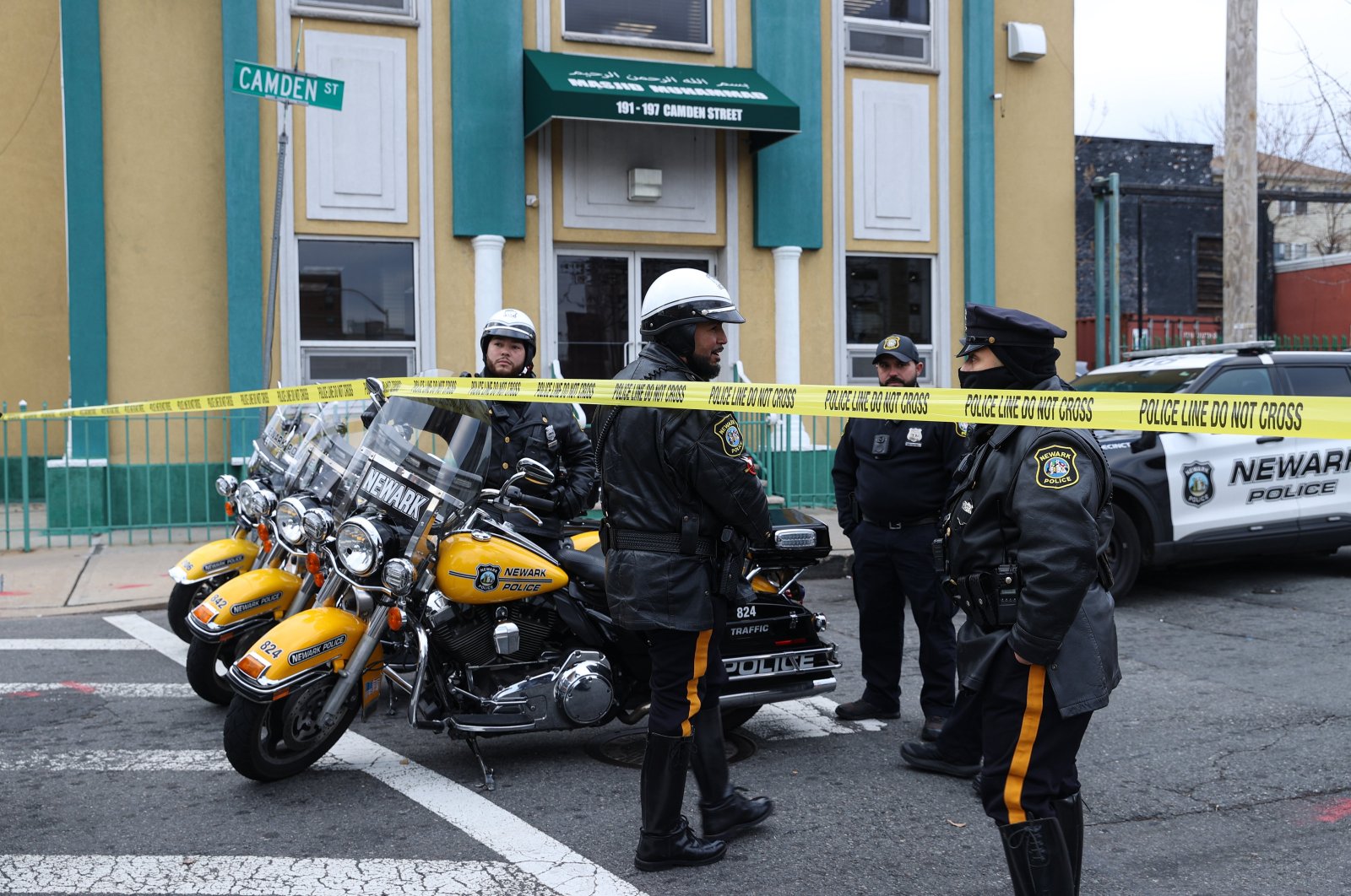 Police officers, vehicles are seen in front of the Masjid-Muhammad-Newark Mosque in Newark, New Jersey, U.S., Jan. 3, 2023. (AA Photo)