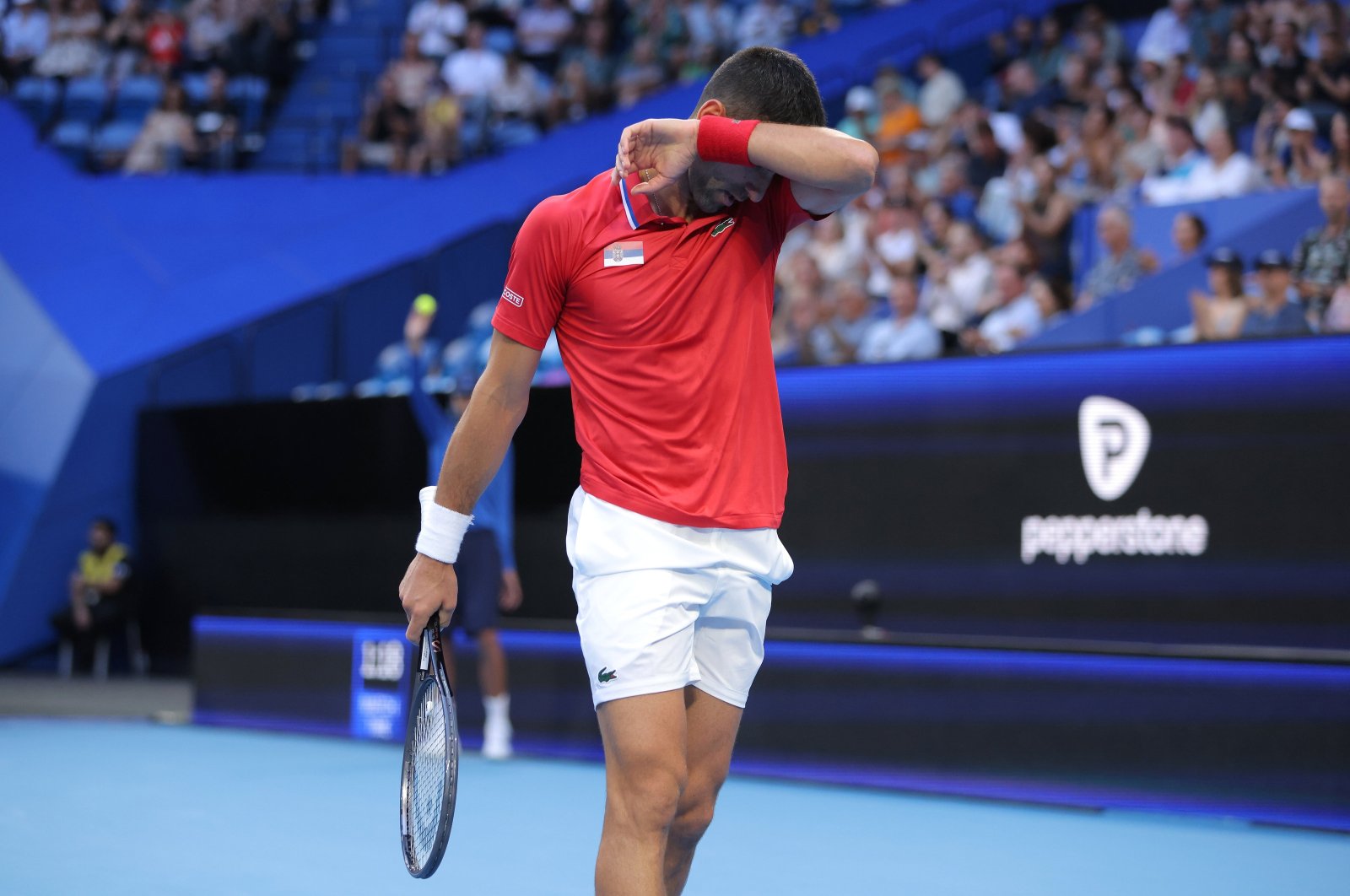 Djokovic wrist injury catches up as Serbia fall to Aussie in UC quarters