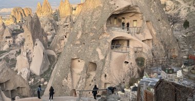 Tourists enjoy a bird's eye view of caves and castles in Cappadocia, Türkiye, Jan. 5, 2024. (AA Photo)