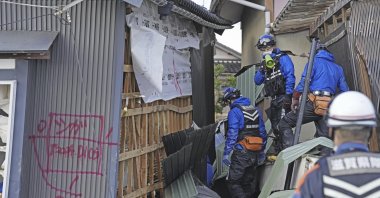 Rescuers conduct a search operation in Suzu, Ishikawa prefecture, Japan, Jan. 5, 2024. (AP Photo)