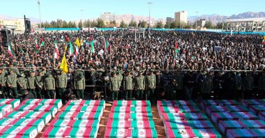 Coffins draped with the Iranian flag during the funeral of victims killed in Jan. 3 twin blasts 3, Tehran, Iran, Jan. 5, 2024. (AFP Photo)