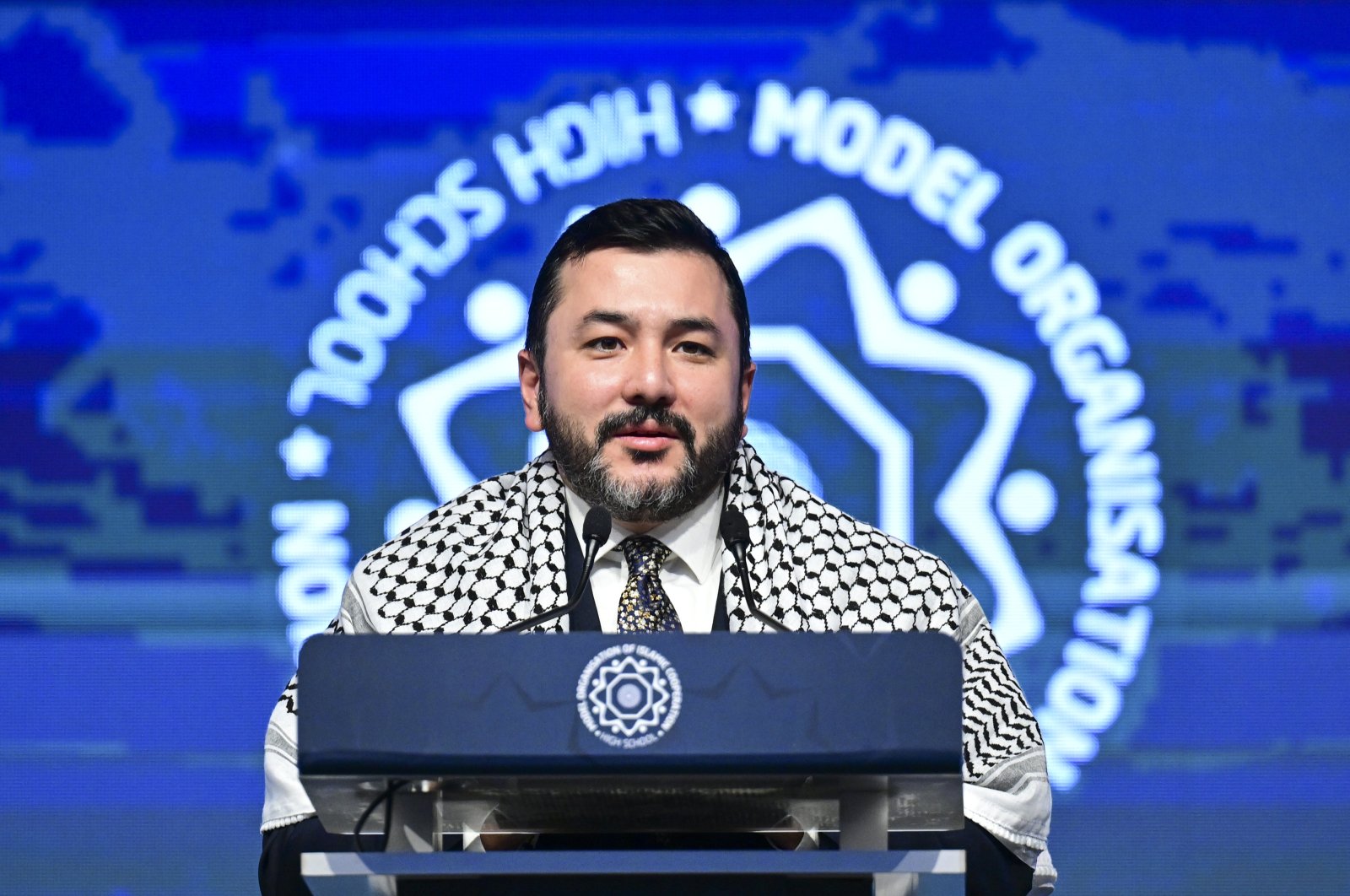 Taha Ayhan, president of the Islamic Cooperation Youth Forum (ICYF), gives the opening speech at the 4th International Model OIC High Schools Summit, Istanbul, Türkiye, Jan. 05, 2023. (AA Photo)