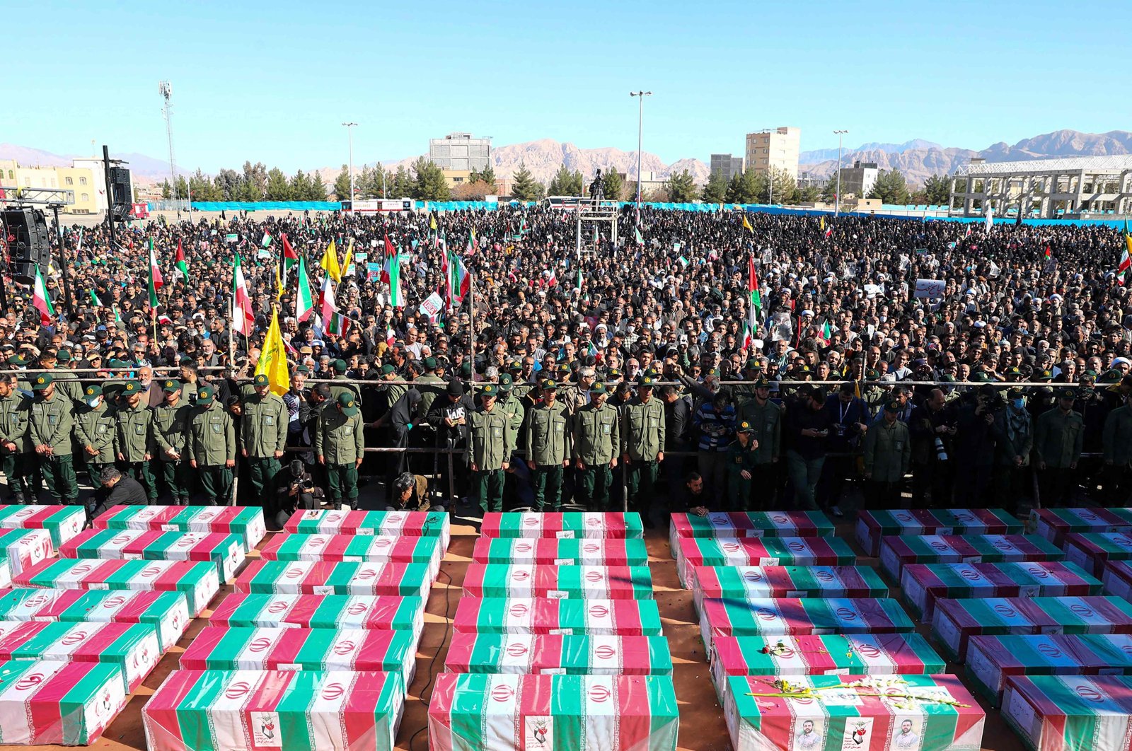 Coffins draped with the Iranian flag during the funeral of victims killed in Jan. 3 twin blasts 3, Tehran, Iran, Jan. 5, 2024. (AFP Photo)