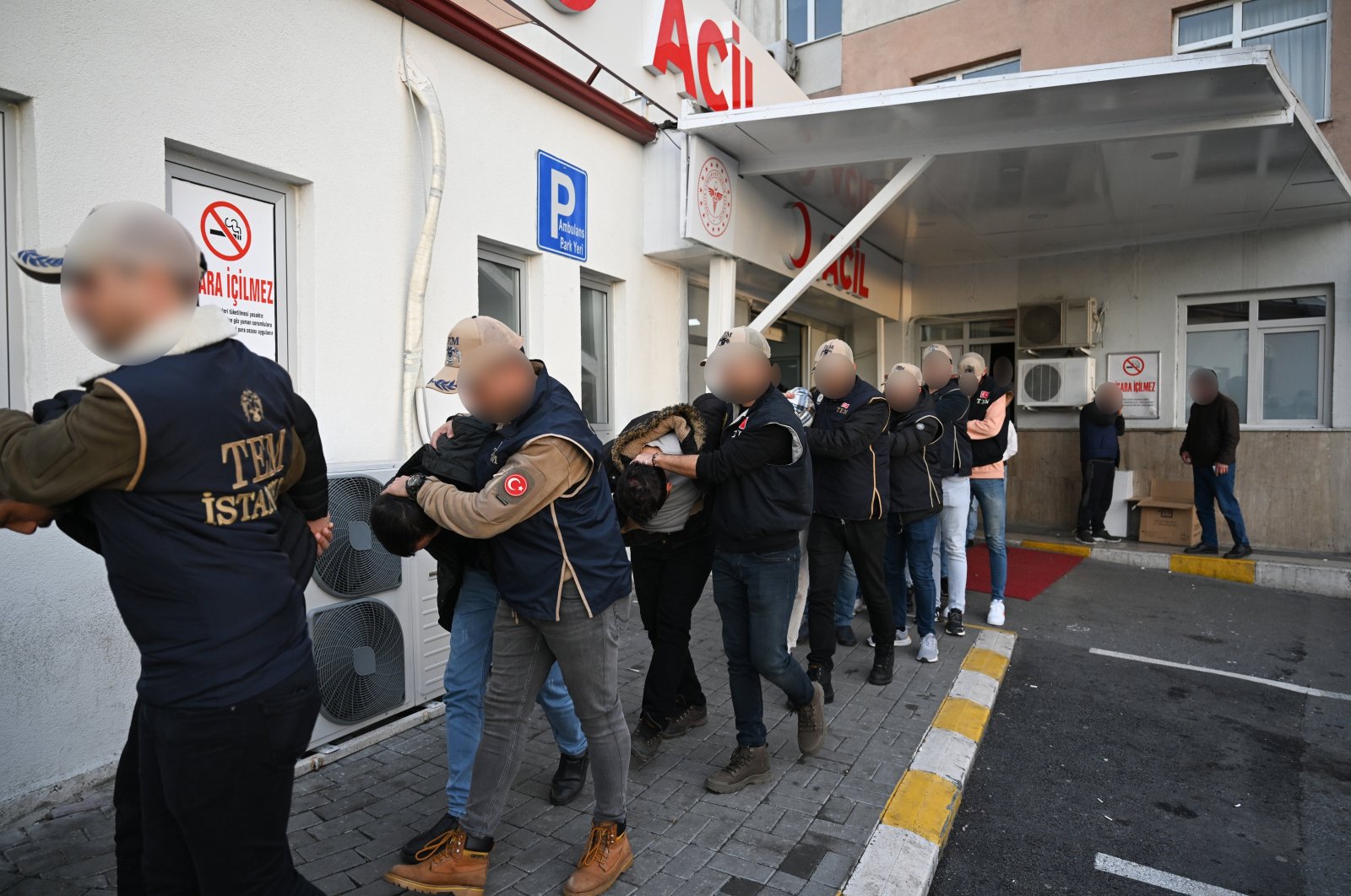 Suspects detained as part of an investigation into Mossad&#039;s activities in Türkiye escorted by police to undergo routine medical checks, Jan 4, 2024. (AA Photo)