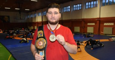 National wrestler Atalay Aydemir, who returned with 2 gold medals from the 7th Deaf Senior World Championship held in Kyrgyzstan, aims to win a gold medal in the 2025 Deaf Olympic Games, Jan. 7, 2023, Ordu, Türkiye, (AA Photo)