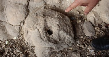 A researcher points to a section of a 2-kilometer-long trench network and control center from World War I, Antalya, Türkiye, Jan. 7, 2024. (DHA Photo)